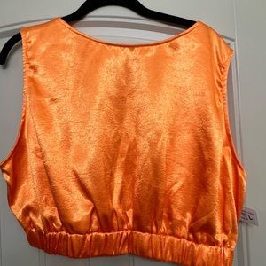 Orange open back tank